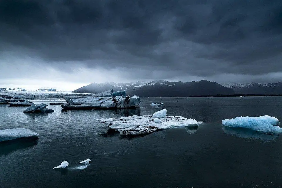Melting glaciers and land ice adds more water to seas.