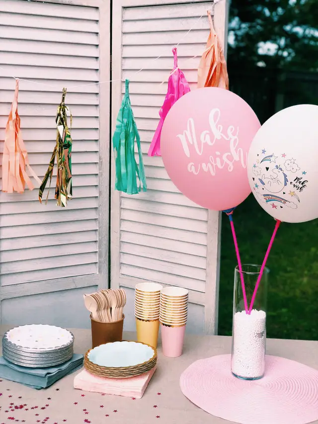 Disposable plates, cups and balloons. pexels